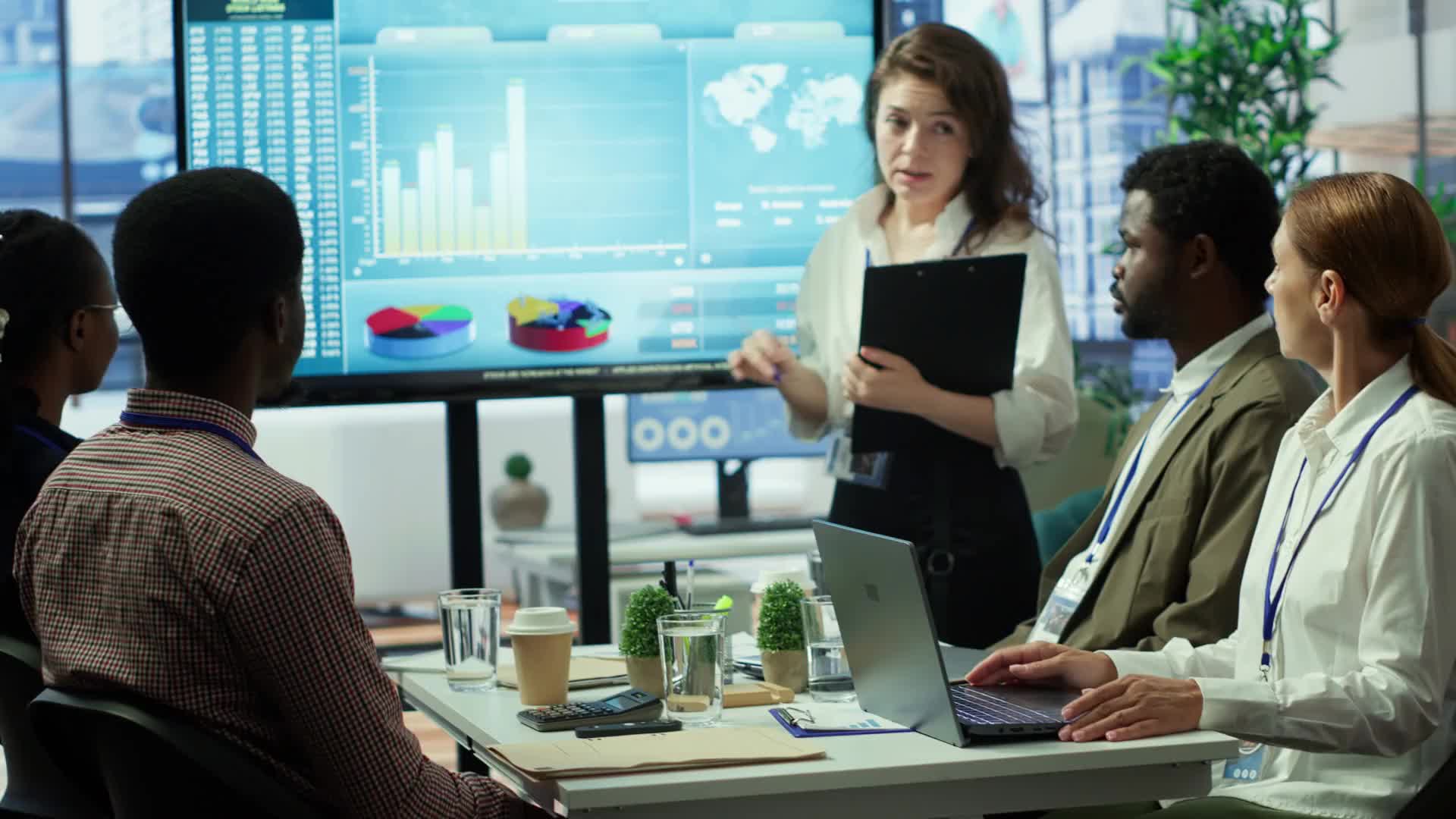 Project management team reviewing delivery plans